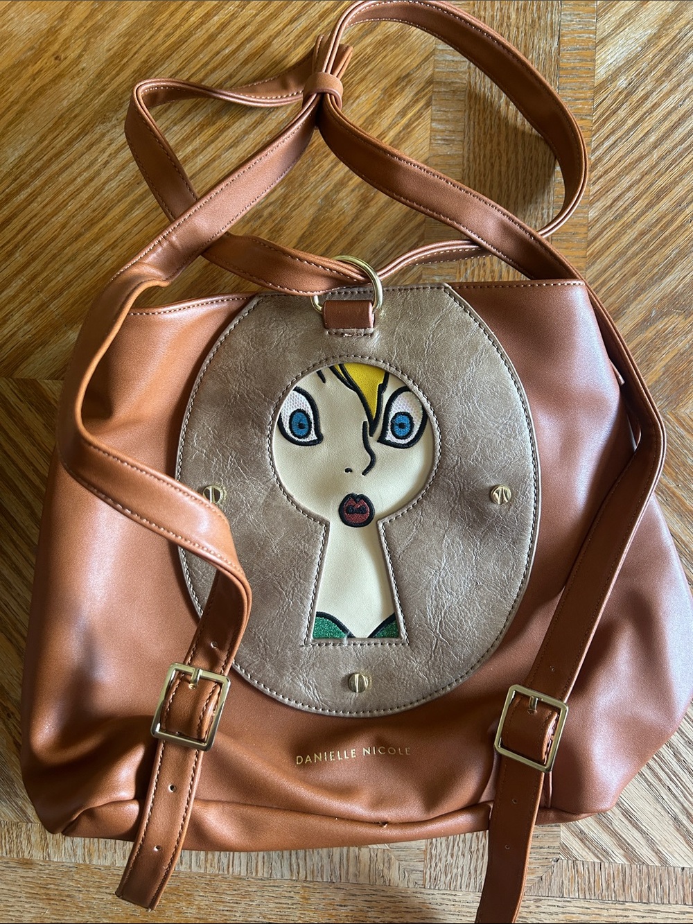 Danielle Nicole Brown/Tan Faux-Leather Shoulder Bag with Keyhole Portrait Accent